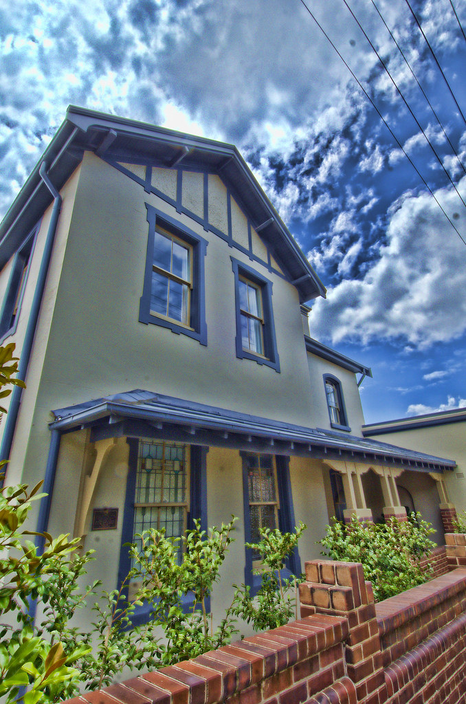 A tile roofline against an open sky